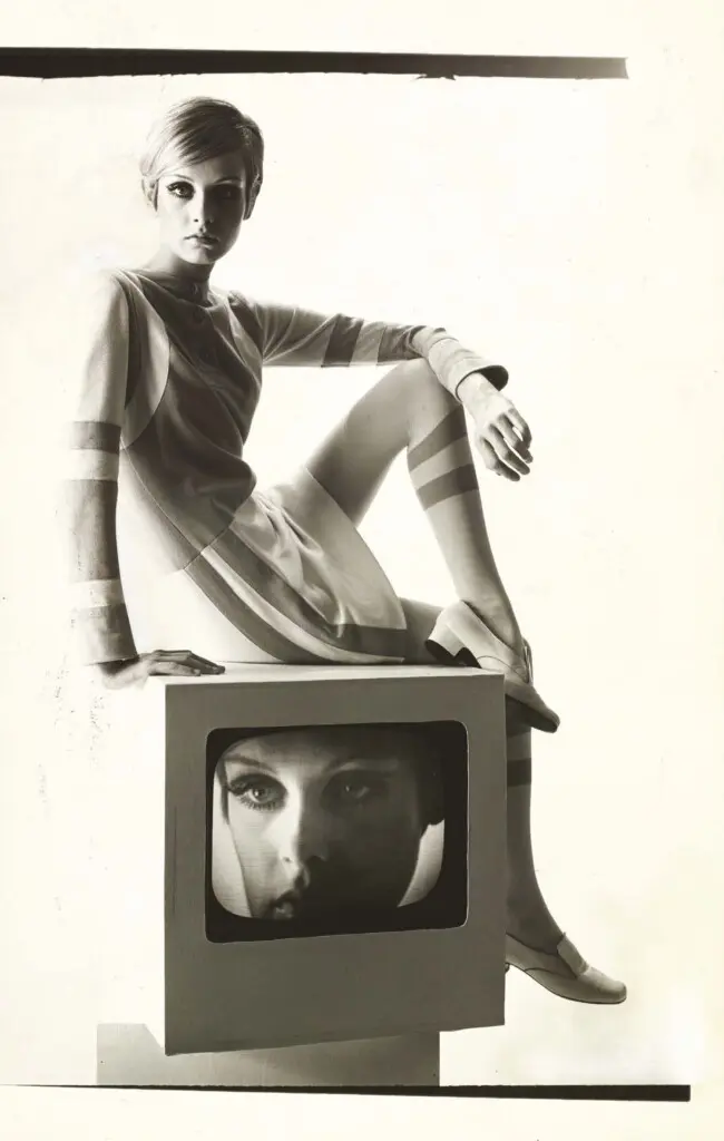 Bert Stern, Twiggy wearing a mod minidress by Louis Féraud and leather shoes by François 